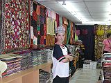 Muscat 03 Mutrah 07 Souq Store The Mutrah Souq retains the chaotic interest of a traditional Arab market, although housed under modern barasti (palm-leaf) roofing. Peter bought a traditional hat.